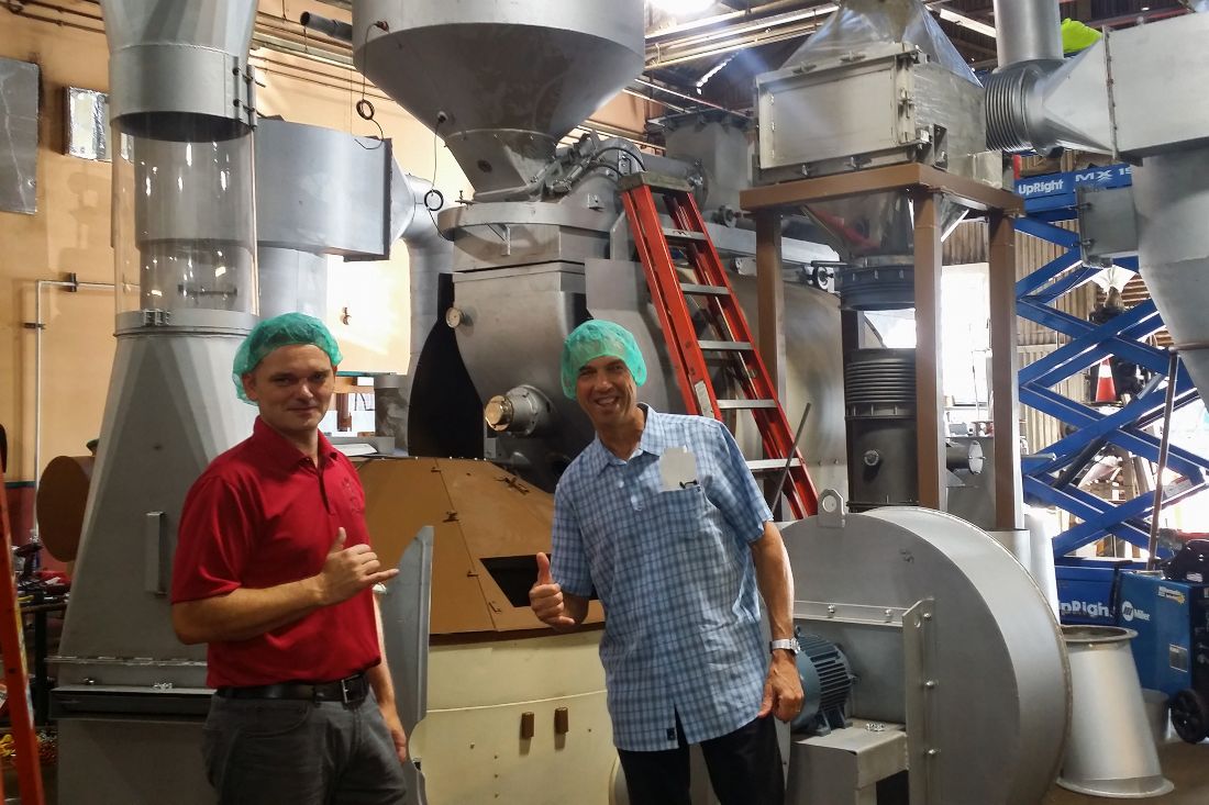 header photo, mike abrams in a coffee roasting facility
